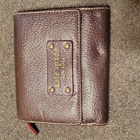 kate spade Handbags - Small Kate Spade wallet snap & zipper closure...sew pictures for condition